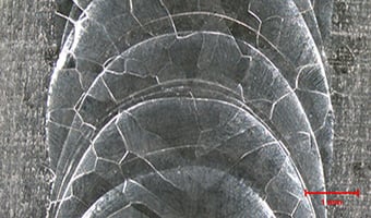 Microscopic image of welding analysis showing evenly layered and neat weldments